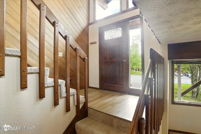 2921 Rocky Bay Cir, Anchorage, AK 99515 - foyer entrance featuring stairway and wood finished floors