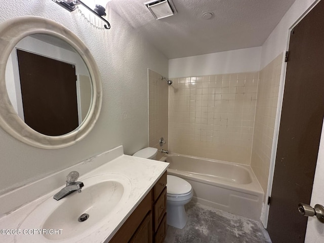 1210 E 16th Ave # 3, Anchorage, AK 99501 - full bath featuring toilet,  shower combination, a textured ceiling, and vanity