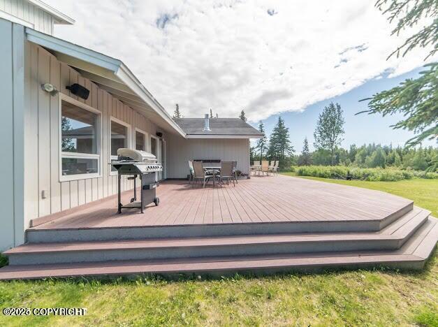 37397 Cetacea Ln, Kenai, AK 99611 - deck featuring outdoor dining area and grilling area