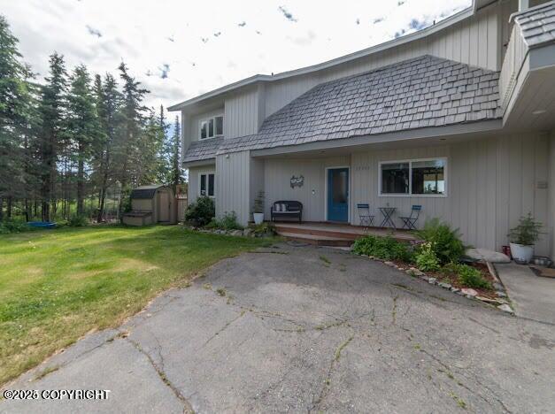 37397 Cetacea Ln, Kenai, AK 99611 - view of front of house featuring a front lawn