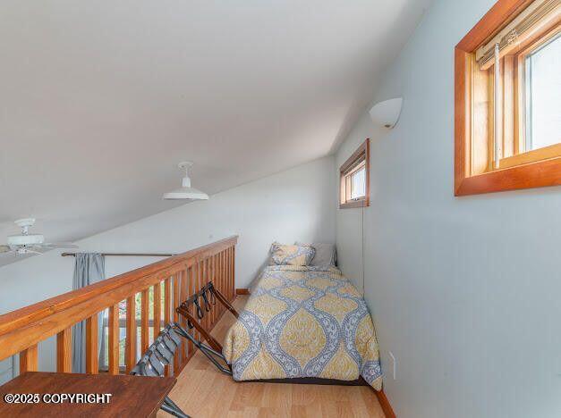 37397 Cetacea Ln, Kenai, AK 99611 - bedroom with wood finished floors and baseboards