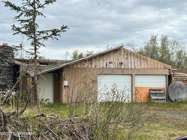 9300 Buddy Werner Dr, Anchorage, AK 99507 - detached garage featuring driveway