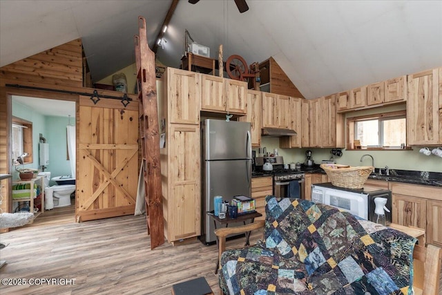 1080 Leuthold Dr, Fairbanks, AK 99712 - kitchen with appliances with stainless steel finishes, light brown cabinetry, high vaulted ceiling, light wood-type flooring, and dark countertops