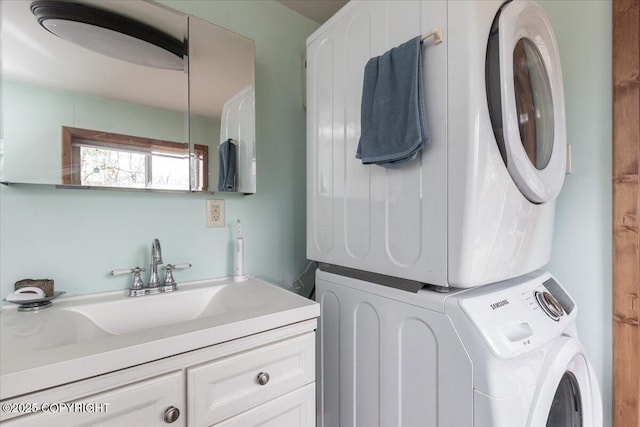 1080 Leuthold Dr, Fairbanks, AK 99712 - washroom with stacked washer and clothes dryer and a sink