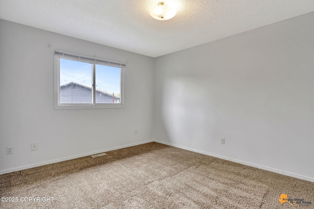 329 Gaylene Cir, Anchorage, AK 99504 - carpeted empty room with a textured ceiling and baseboards