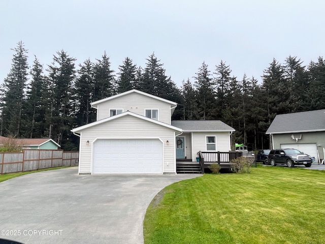 517 Sut Larsen Way, Kodiak, AK 99615 - view of front of property featuring driveway, a wooden deck, and a garage