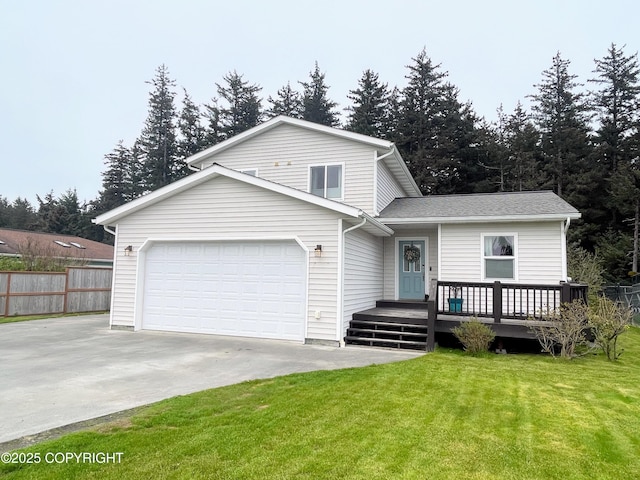 517 Sut Larsen Way, Kodiak, AK 99615 - tri-level home featuring driveway, an attached garage, and a deck