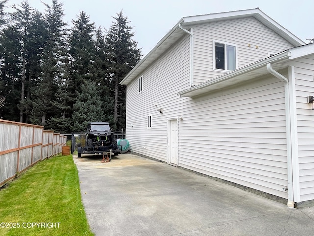 517 Sut Larsen Way, Kodiak, AK 99615 - view of property exterior featuring driveway and a patio area