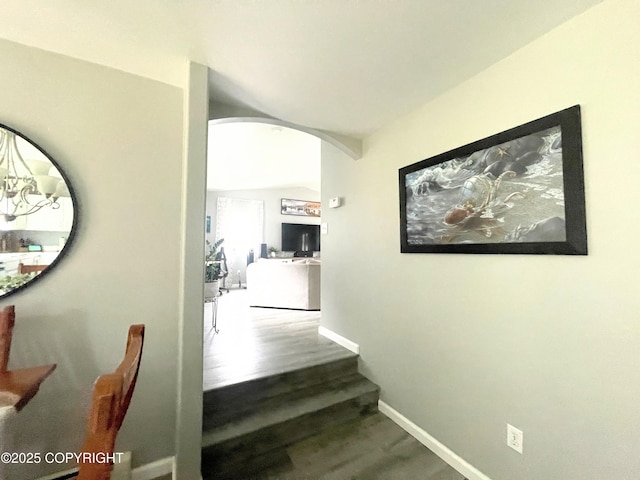 517 Sut Larsen Way, Kodiak, AK 99615 - hall with arched walkways, wood finished floors, baseboards, and vaulted ceiling