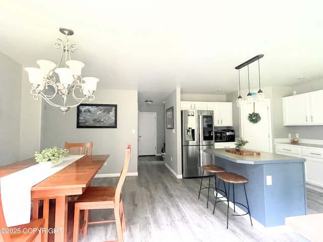 517 Sut Larsen Way, Kodiak, AK 99615 - kitchen with appliances with stainless steel finishes, white cabinetry, and light wood-style floors
