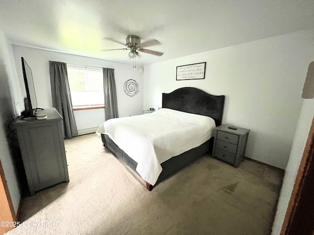 517 Sut Larsen Way, Kodiak, AK 99615 - bedroom with light colored carpet, ceiling fan, and baseboards