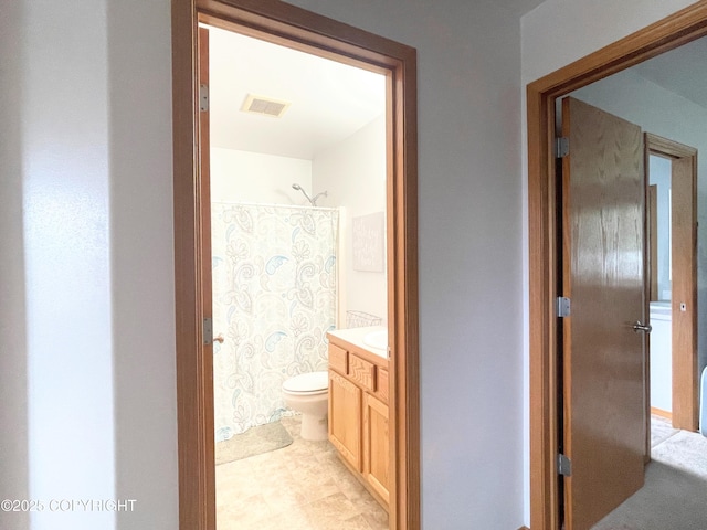 517 Sut Larsen Way, Kodiak, AK 99615 - full bathroom featuring curtained shower, vanity, and toilet