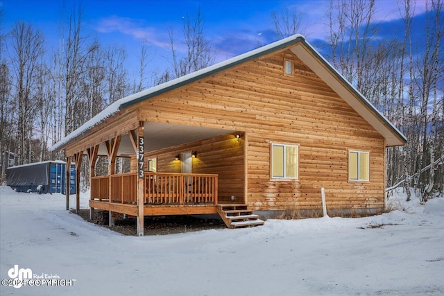 33773 Ruth Glacier Ave, Talkeetna, AK 99676 - snow covered house featuring a wooden deck