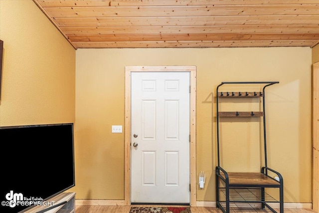 33773 Ruth Glacier Ave, Talkeetna, AK 99676 - foyer with wood ceiling, baseboards, and light wood-style flooring