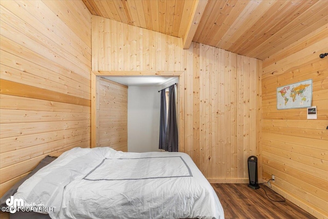 33773 Ruth Glacier Ave, Talkeetna, AK 99676 - bedroom featuring wooden walls, wooden ceiling, dark wood-style flooring, and baseboards