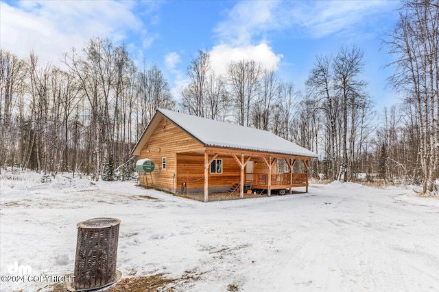 33773 Ruth Glacier Ave, Talkeetna, AK 99676 - snow covered structure featuring a porch