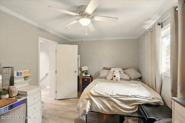 bedroom featuring light wood-type flooring, crown molding, and a ceiling fan