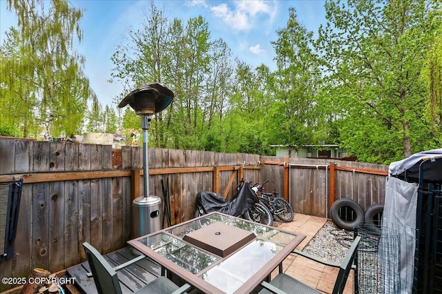 fenced backyard featuring outdoor dining space