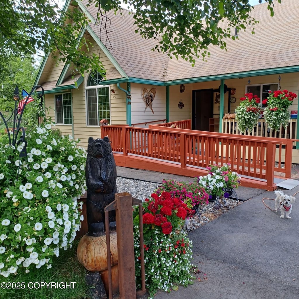 2541 S Teeland St, Wasilla, AK 99623 - back of property with a shingled roof