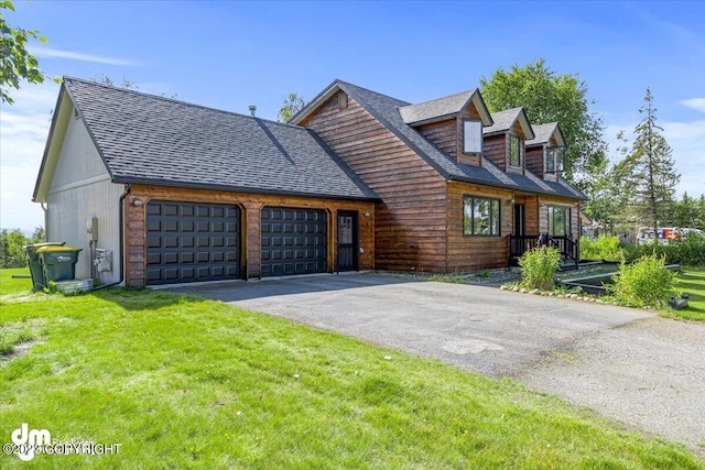 174 E Leota St, Wasilla, AK 99654 - rustic home with an attached garage, driveway, a front lawn, and a shingled roof