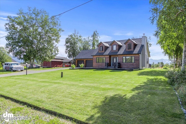 174 E Leota St, Wasilla, AK 99654 - cape cod home with a chimney, a front lawn, driveway, and roof with shingles
