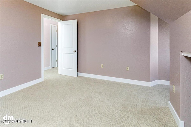 174 E Leota St, Wasilla, AK 99654 - spare room with light colored carpet and baseboards