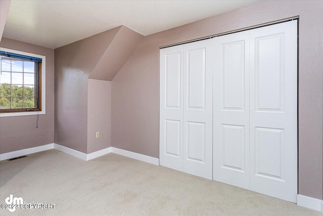 174 E Leota St, Wasilla, AK 99654 - additional living space with light colored carpet and baseboards