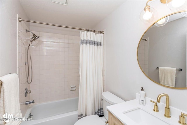 174 E Leota St, Wasilla, AK 99654 - bathroom featuring shower / bath combo, toilet, and vanity