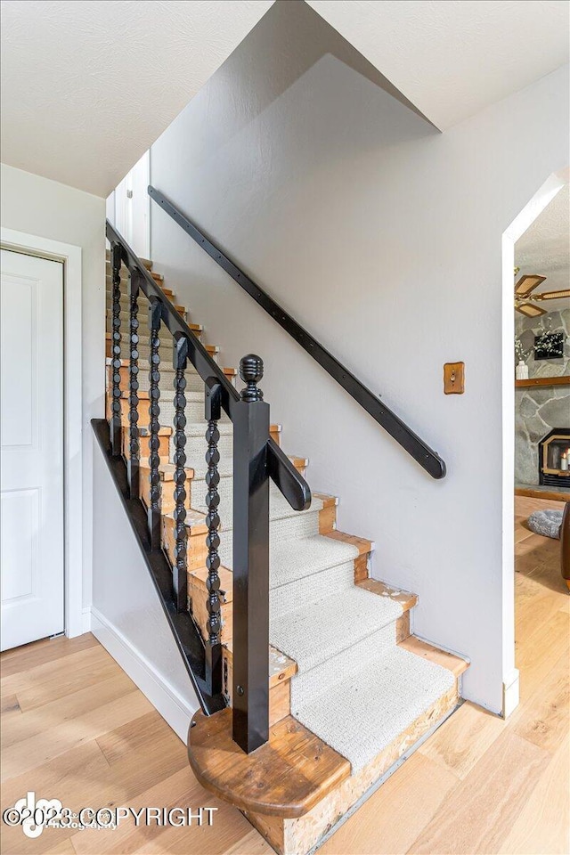 174 E Leota St, Wasilla, AK 99654 - stairway with wood finished floors