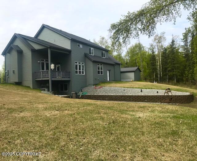 2295 N Filly Cir, Wasilla, AK 99654 - rear view of house with a lawn