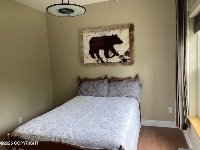 2295 N Filly Cir, Wasilla, AK 99654 - bedroom with wood finished floors and baseboards