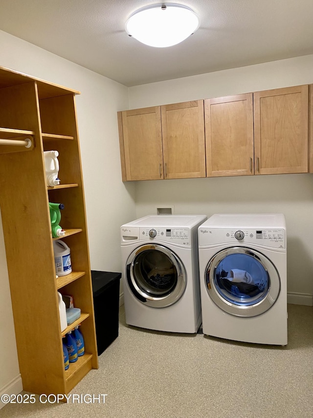 2295 N Filly Cir, Wasilla, AK 99654 - laundry area featuring separate washer and dryer and cabinet space