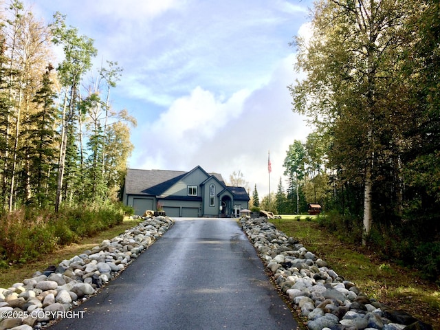 2295 N Filly Cir, Wasilla, AK 99654 - view of front of home with asphalt driveway and a garage