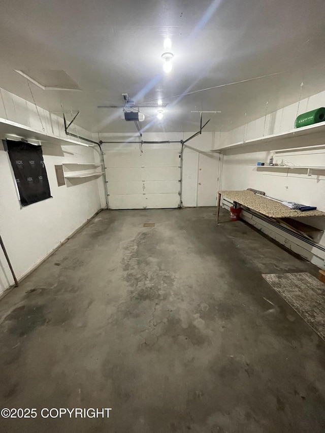 412 Pine Cir, Kenai, AK 99611 - garage featuring a garage door opener and electric panel