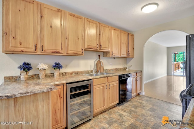 4147 Hampton Dr # 10D, Anchorage, AK 99504 - kitchen with wine cooler, light brown cabinets, black appliances, and a sink