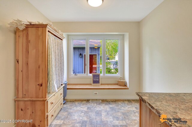 4147 Hampton Dr # 10D, Anchorage, AK 99504 - entryway with stone finish floors and baseboards