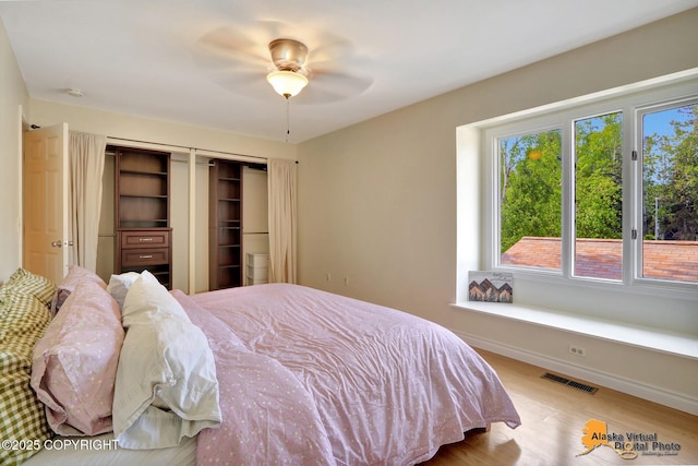 4147 Hampton Dr # 10D, Anchorage, AK 99504 - bedroom with wood finished floors, a closet, and ceiling fan