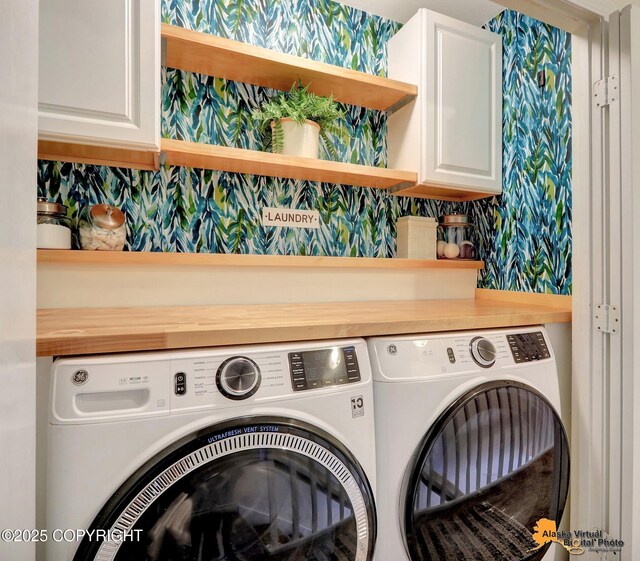 4147 Hampton Dr # 10D, Anchorage, AK 99504 - laundry room with independent washer and dryer and cabinet space