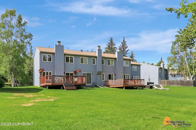 4147 Hampton Dr # 10D, Anchorage, AK 99504 - back of house featuring a wooden deck and a chimney