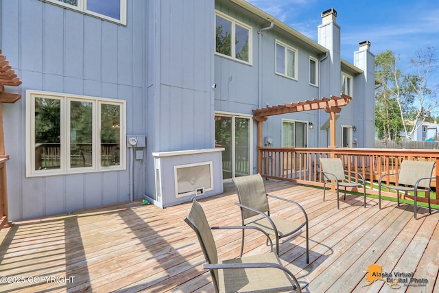 4147 Hampton Dr # 10D, Anchorage, AK 99504 - wooden deck with a pergola