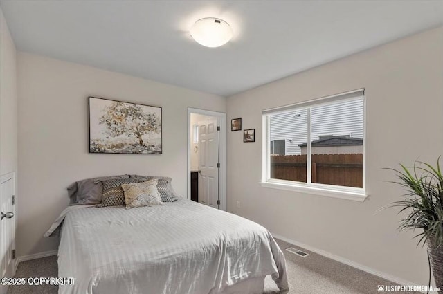 2370 Irontree Pl # 3, Anchorage, AK 99508 - carpeted bedroom featuring baseboards