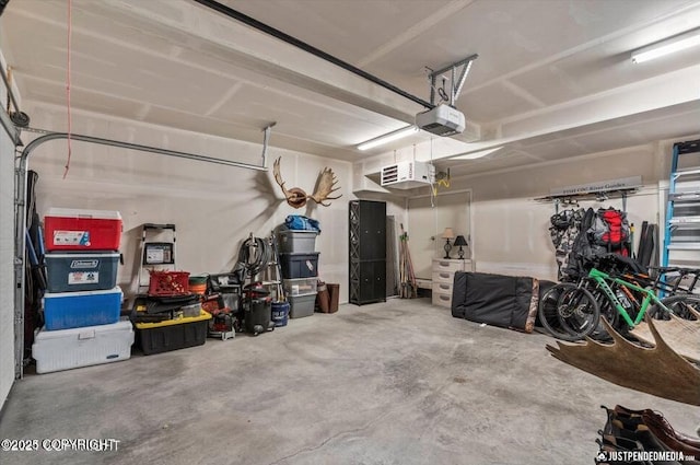 2370 Irontree Pl # 3, Anchorage, AK 99508 - garage featuring a garage door opener