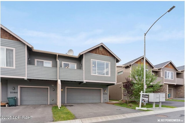 2370 Irontree Pl # 3, Anchorage, AK 99508 - multi unit property featuring a garage and driveway