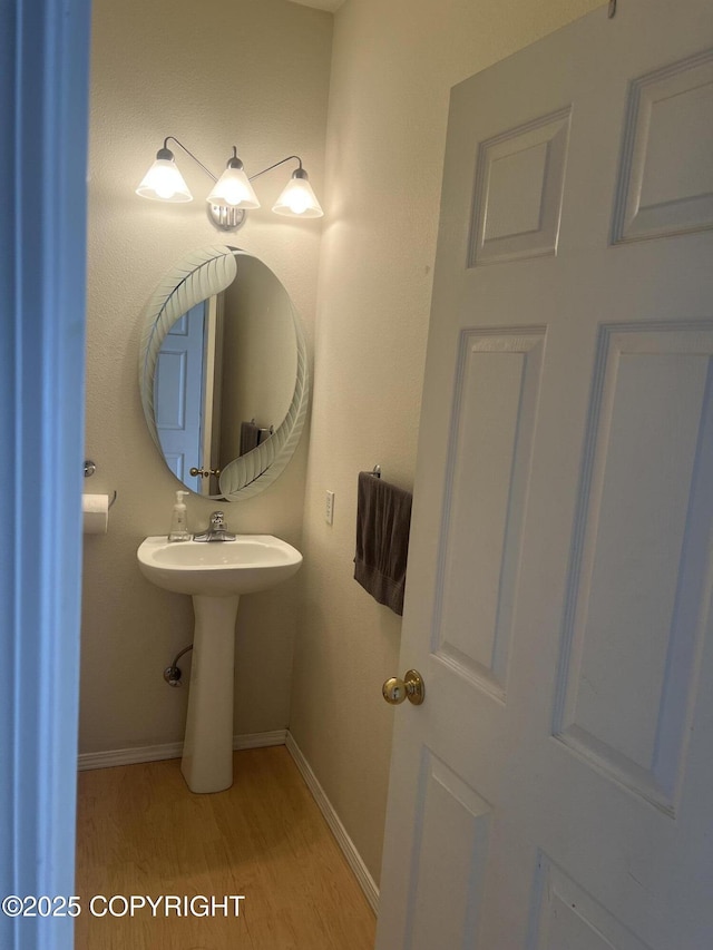 4766 Grumman St Unit 4766, Anchorage, AK 99507 - bathroom featuring wood finished floors and baseboards