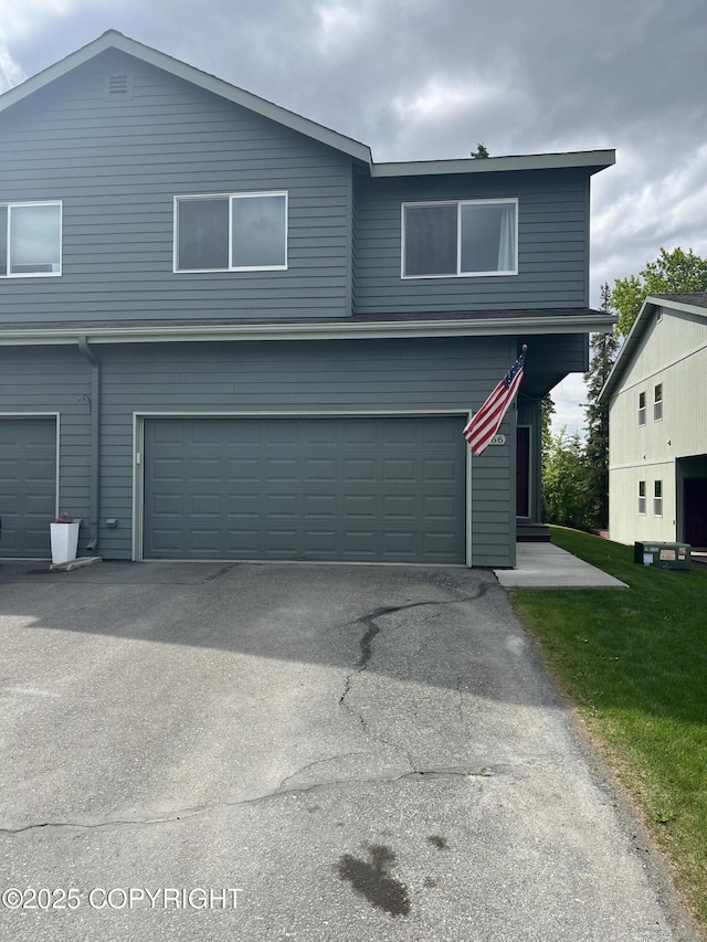 4766 Grumman St Unit 4766, Anchorage, AK 99507 - view of front facade with a garage and driveway