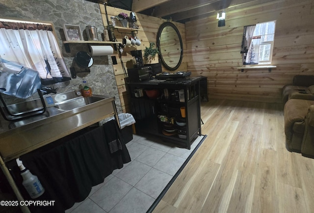 2246 S Fian Dr, Wasilla, AK 99654 - living area with wooden walls and light wood-style flooring