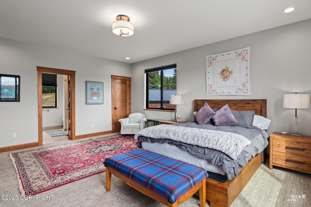 52619 Chumelina Ct, Kasilof, AK 99610 - bedroom with carpet flooring, recessed lighting, baseboards, and ensuite bathroom