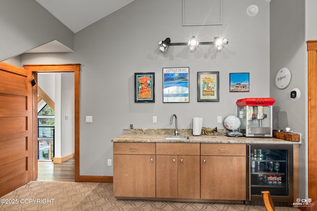 52619 Chumelina Ct, Kasilof, AK 99610 - indoor wet bar featuring beverage cooler and baseboards