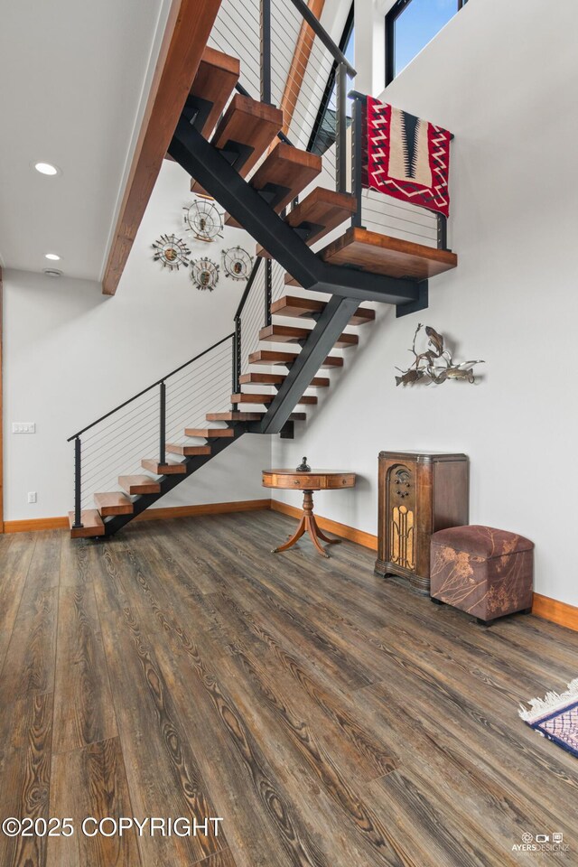 52619 Chumelina Ct, Kasilof, AK 99610 - staircase featuring wood finished floors, baseboards, and recessed lighting