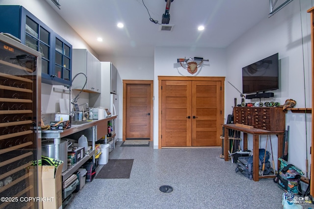 52619 Chumelina Ct, Kasilof, AK 99610 - foyer entrance featuring recessed lighting, beverage cooler, and speckled floor